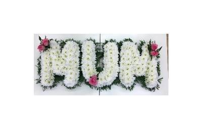 Foliage edge MUM lettering with white chrysanthemum and pink focals. 