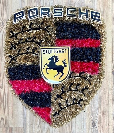 Porsche Badge funeral tribute created with sprayed chrysanthemum and printed details. 