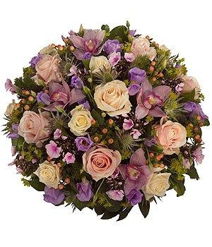 Pretty pastel funeral posy tribute including roses, orchids and hypericum berries. 