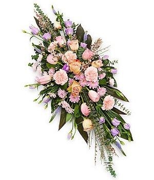 Pink and mauve double-ended spray with mixed seasonal florals and delicate foliage.