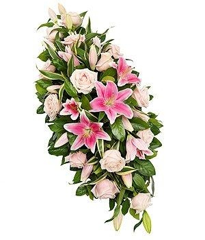 Soft pink rose and lily double ended casket spray is a beautiful mix of delicate luxury.