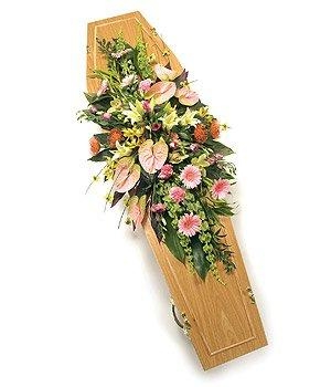 Pretty in pink double ended casket spray including rose, orchid and carnation. 