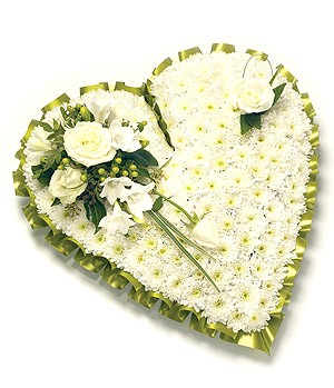 Classic heart-shaped funeral tribute with white chrysanthemums, featuring a mix of seasonal flowers to create a focal point. Customizable colour options available.