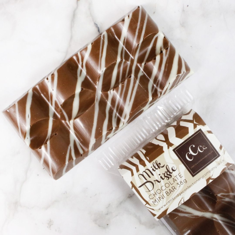 Cambridge Confectionery Company mini milk chocolate bar with white chocolate drizzle.