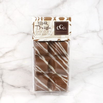 Cambridge Confectionery Company mini milk chocolate bar with white chocolate drizzle.