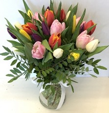 Bouquet solely made of english grown spring tulips, Hand tied in water with luxury wrap and bag. 