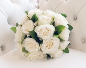 White rose and salal foliage wedding collection including 1 x bridal bouquet, 2 x bridesmaid bouquets and 6 x buttonholes. 