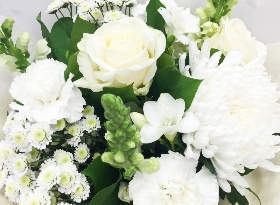 Creamy bouquet of white roses, blooms and chrysanthemum. 