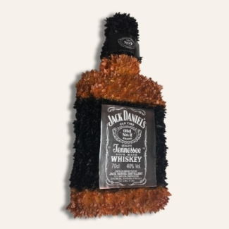 Jack Daniels bottle funeral tribute with sprayed chrysanthemum base, laminated logo and badge.