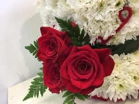 3D cup of tea funeral tribute made with chrysanthemum and spray carnation. 