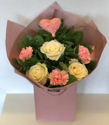 Modern bouquet including glittered white roses and pale pink carnations, finished with diamanté scatter and luxury wrap. 