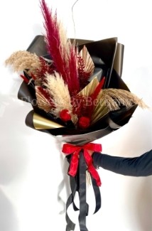 Stunning dried floral bouquet including pampas, spear palms and forever roses. 