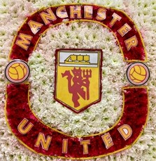 Manchester United funeral tribute, created using chrysanthemum and carnations.