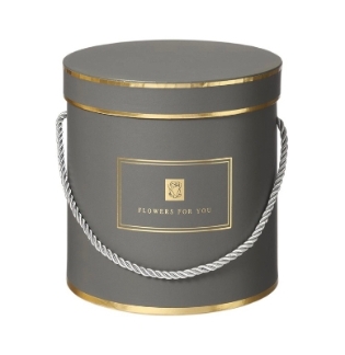 Grey Hamilton hat box with gold detailing and rope handles. 