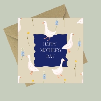 Mother’s Day greeting card with illustrated white ducks, small spring flowers and a navy centre panel reading Happy Mother’s Day, paired with a kraft envelope.