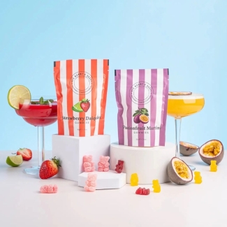 Ask Mummy & Daddy Strawberry Daiquiri palm-oil-free, gluten-free, dairy-free cocktail gummies in a red and white stripe gift pouch.