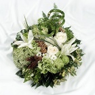 Textured white and green posy pad made with roses, lily and bamboo. 