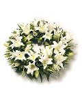 Funeral wreath created using pure white lily to give a dramatic vibe. 